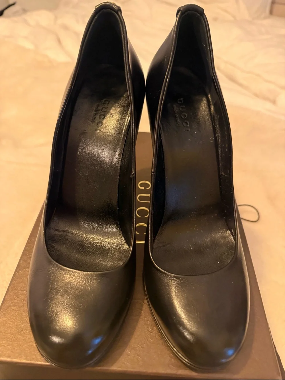 Authentic Gucci Black Leather Pumps with Gold GG logo
